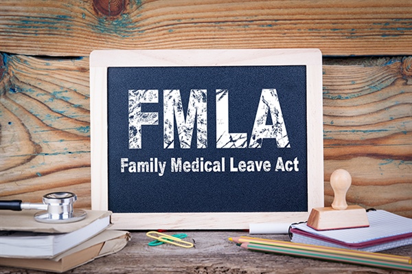 An image showing letters FMLA and the words Family Medical Leave Act