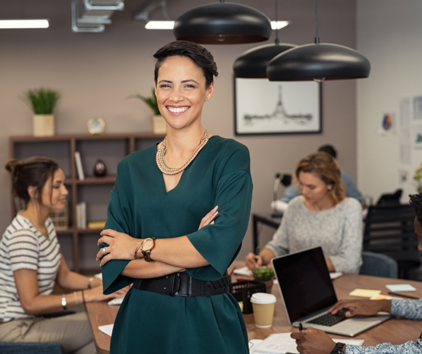 women standing in an office