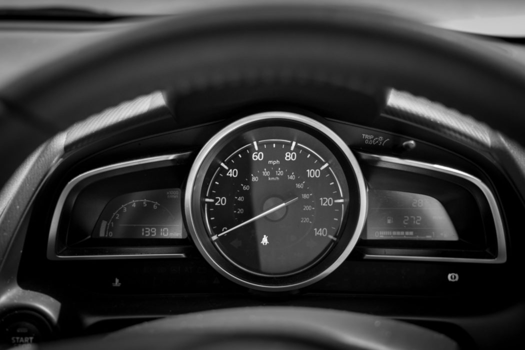 dashboard of a car showing black and white