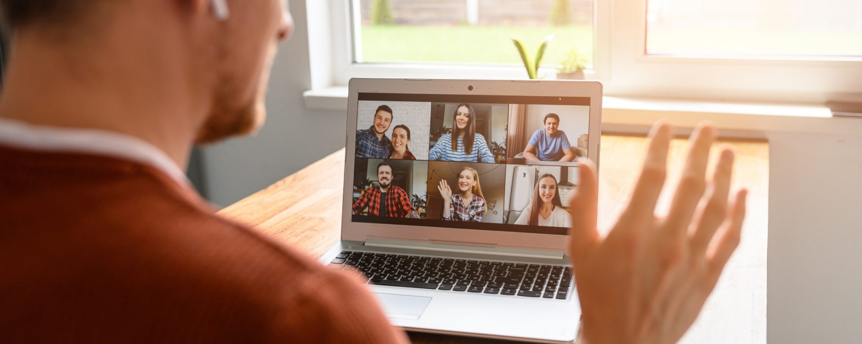 Image of Zoom meeting on a laptop screen