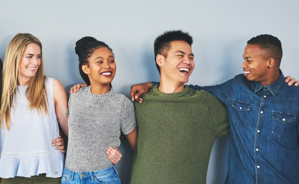 Group of friends with their arms around each other