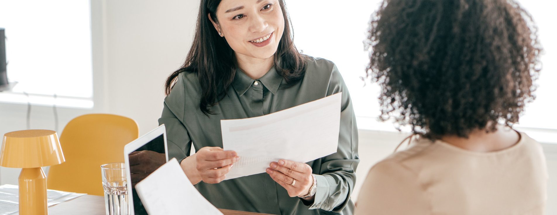 Two women talking during interview