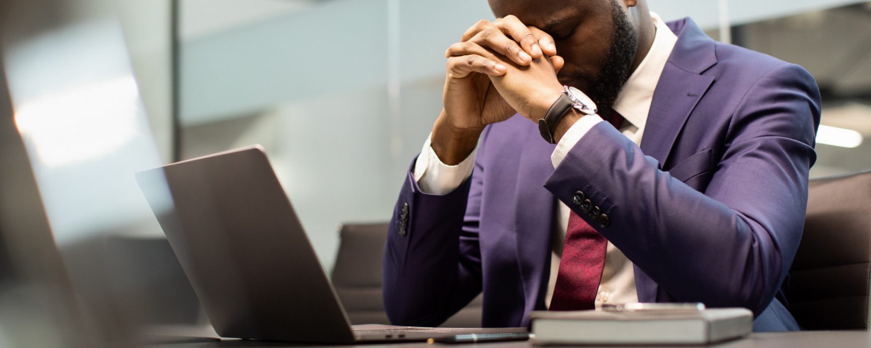 A person displaying employee burnout in the workforce