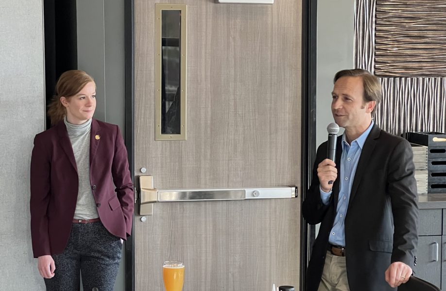 Sen Mallory McMorrow and Brian Calley stand together at Brown Iron Brewhouse in Royal Oak