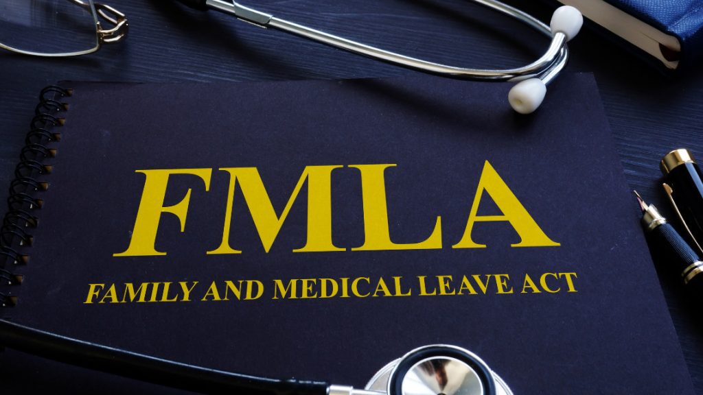 Photo of the acronym FMLA relative to an employee on leave