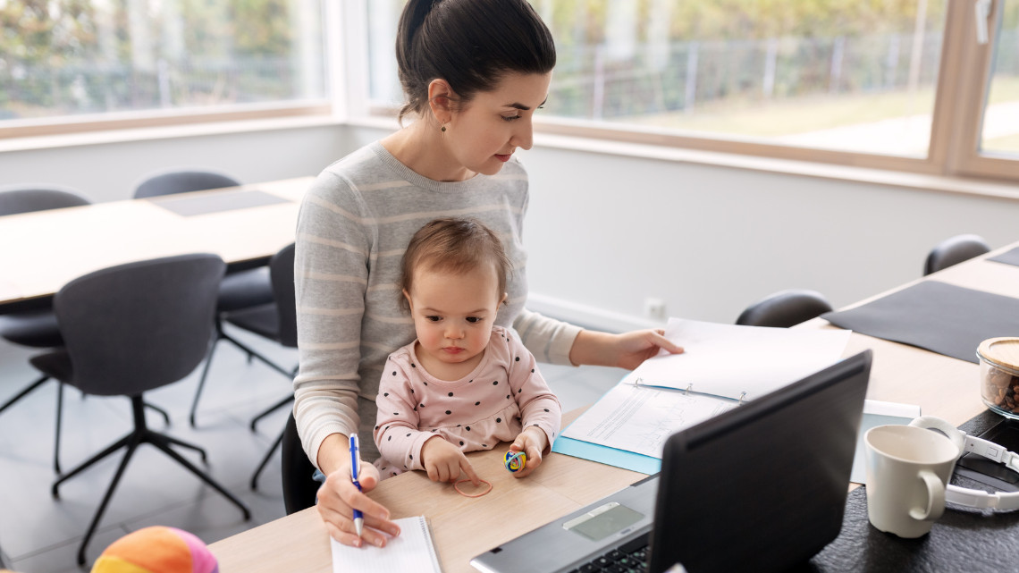 Working mother in a remote office