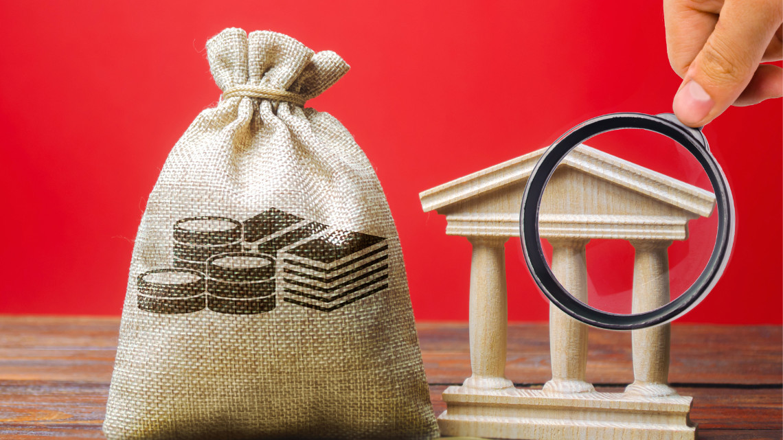 Image illustrating the capitol and a bag of money representing the state budget