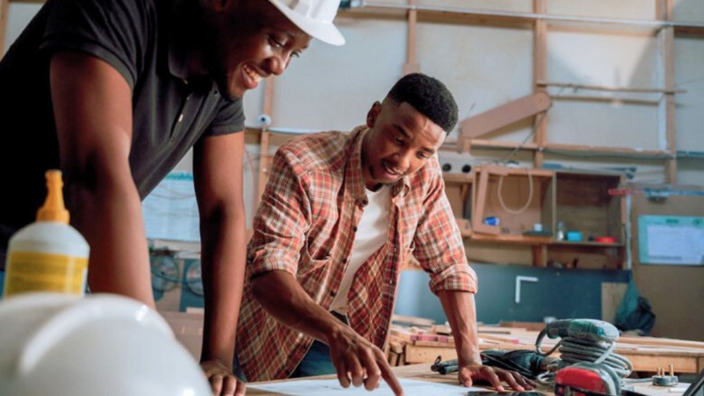 Two people engaged in an apprenticeship program