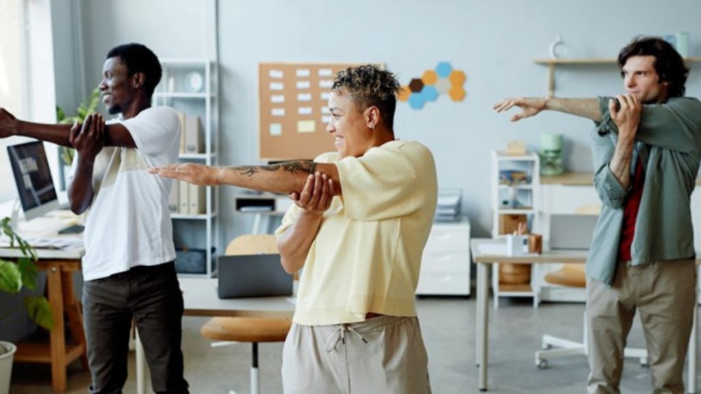 People engaging in workplace wellness activities