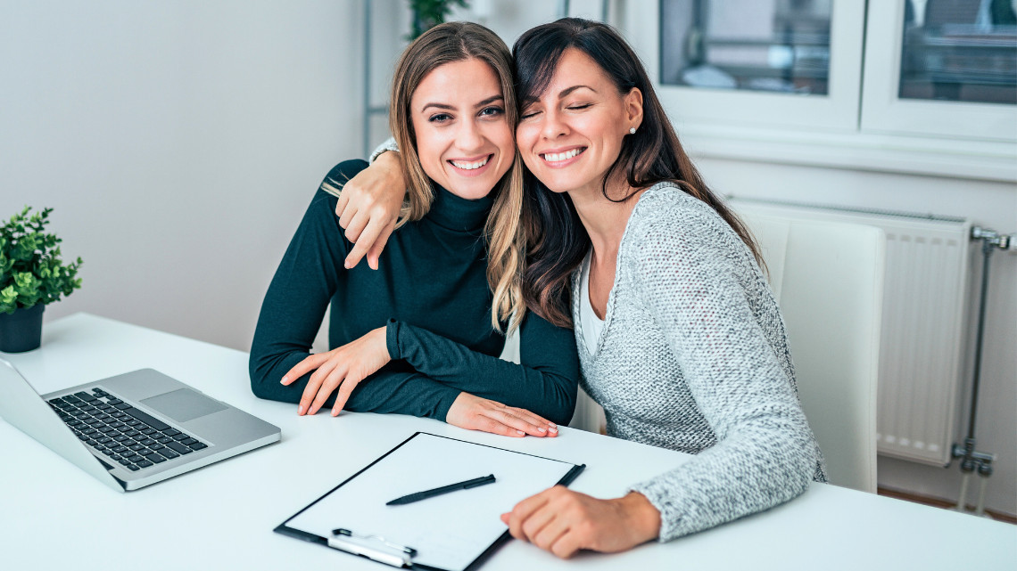 Image of two people acting as a work bestie