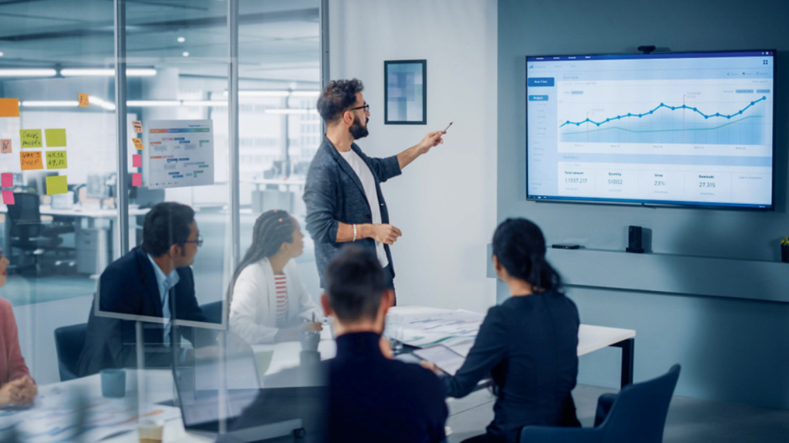 team discussing revenue in the workplace