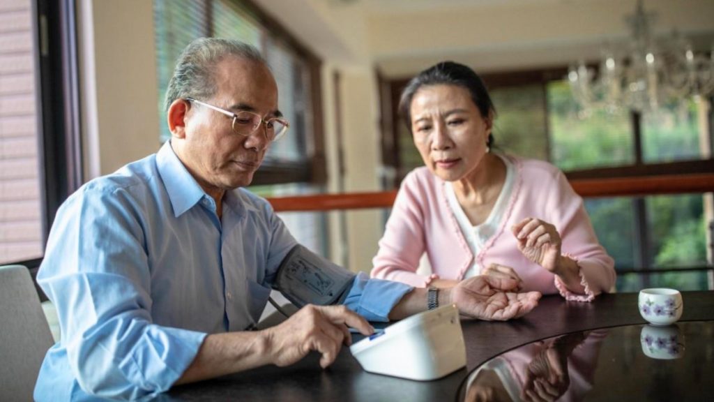 people taking their blood pressure at home