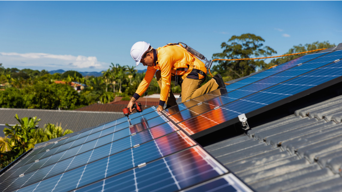 solar panels on a house representing clean energy tax credits