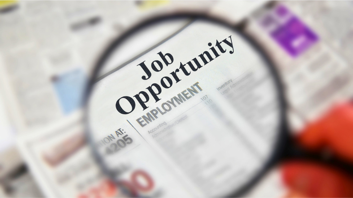 classified ad in newspaper representing job creation