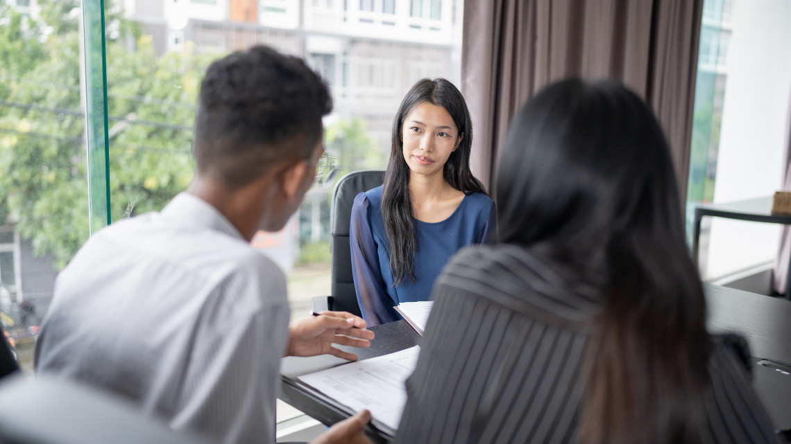 Company doing an in-person interview with candidate.