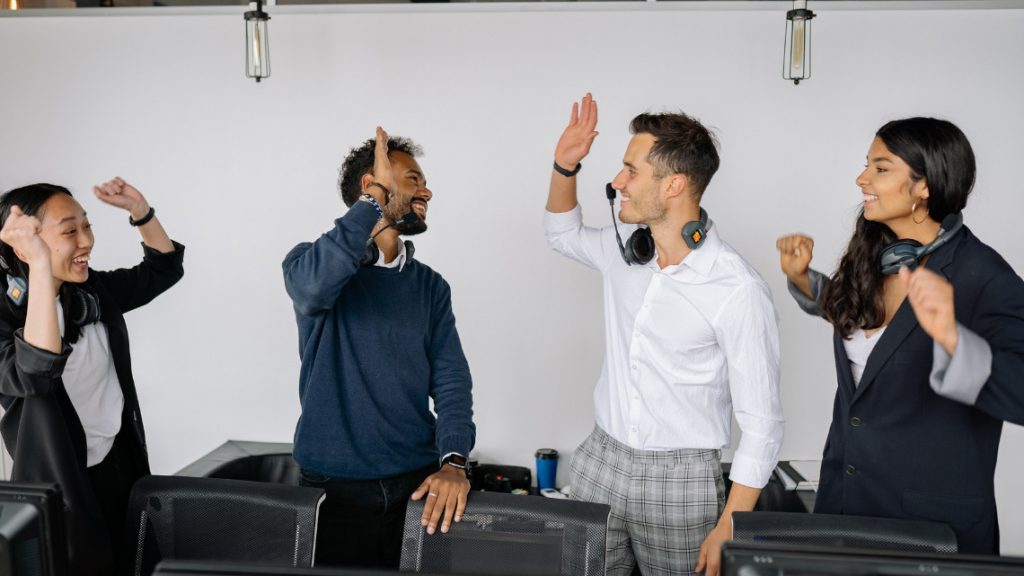 Positive interaction between employees in a fun workplace.