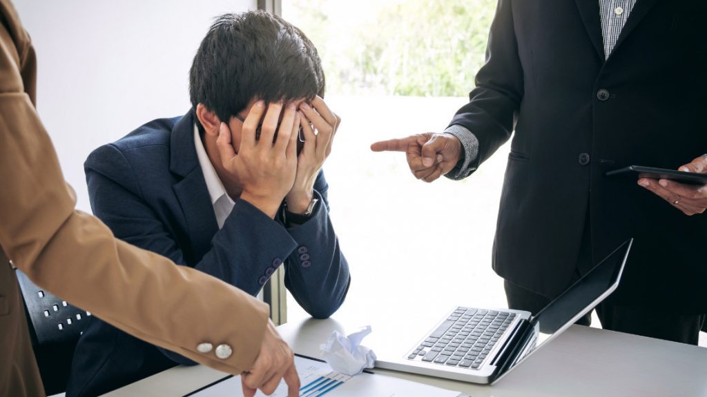 Employee stressed out contemplating quitting.
