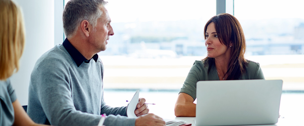 two people discussing family businesses