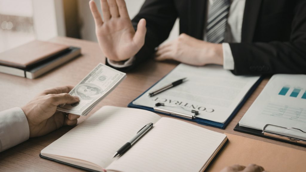 Person rejecting offer on business agreement.