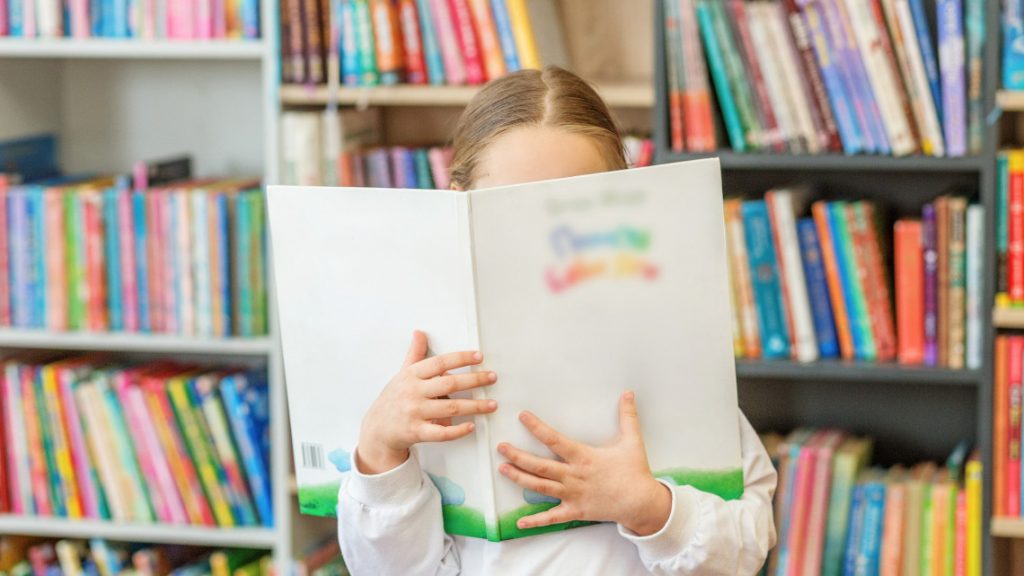 child reading book